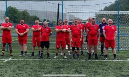 Cambrian walking footballers on song